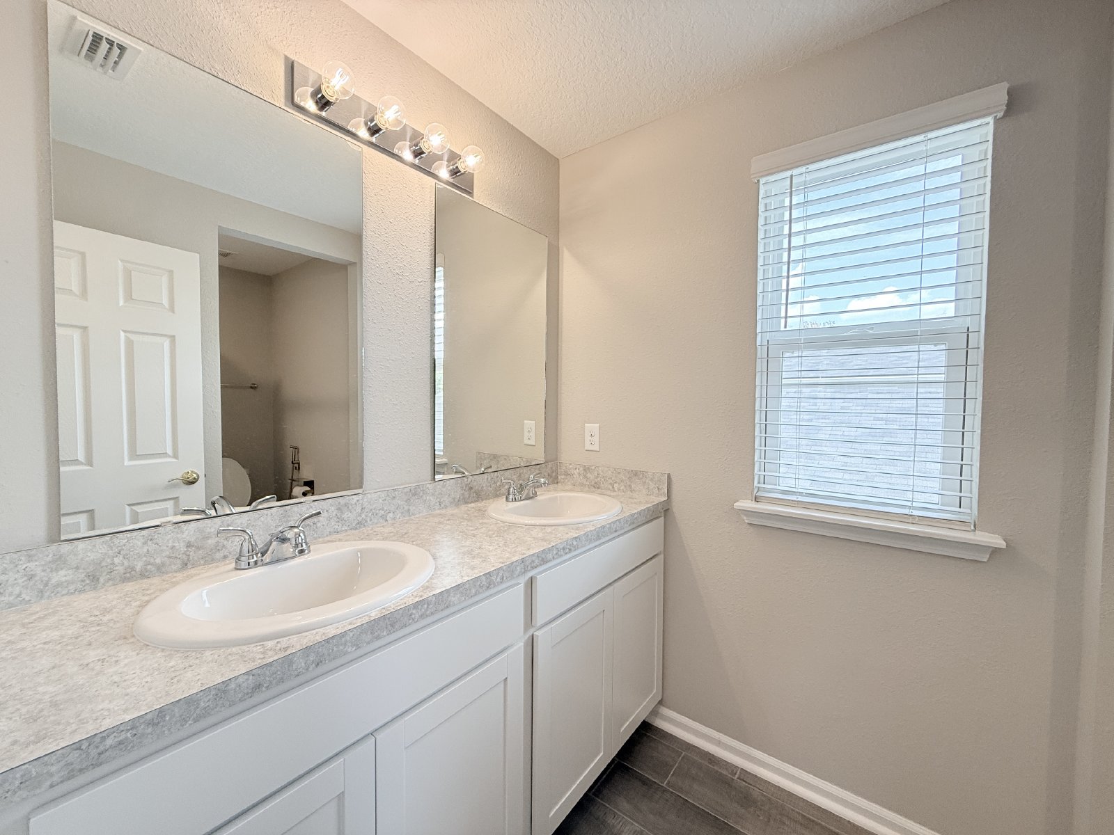 Bright & Spacious 4BR Home with Screened Porch & Paver Patio property image